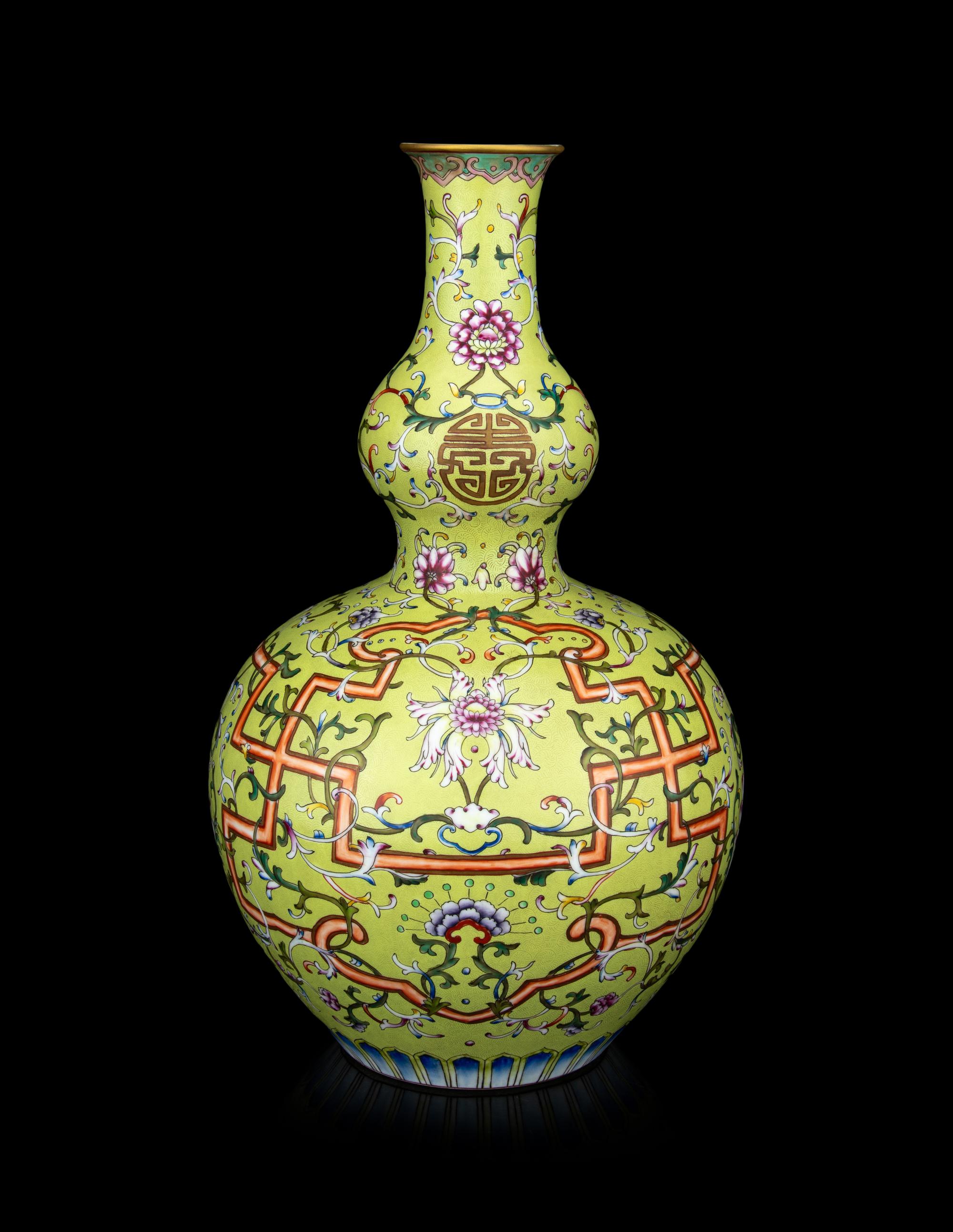 A Chinese Lime Ground Famille Rose Porcelain Double Gourd Vase