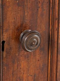 An Italian Baroque Walnut Cabinet