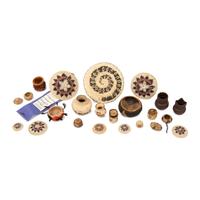 A Collection of Pomo, Tohono-O'odham, and Navajo Miniature Baskets