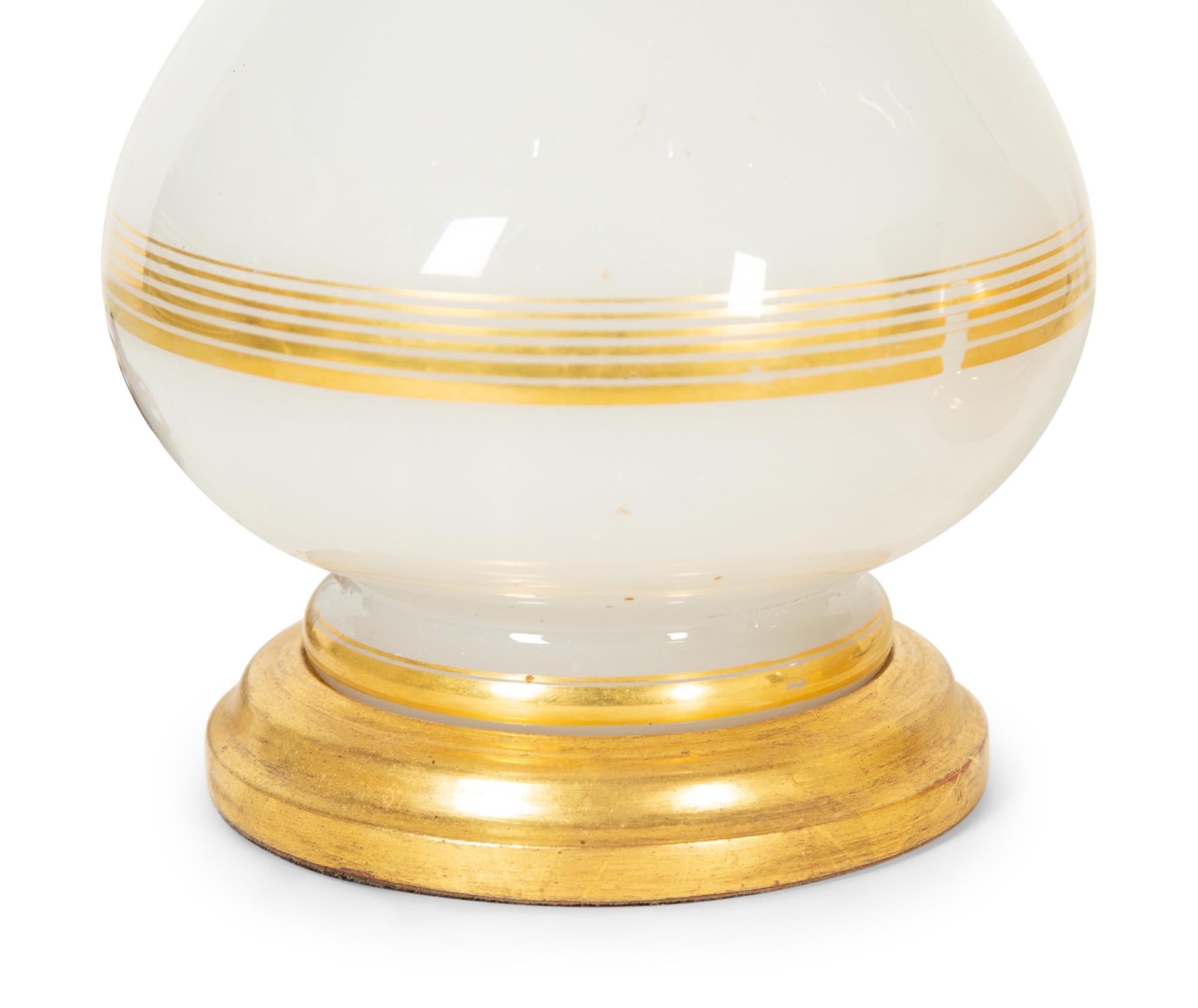 A Pair of Gilt Decorated Opaline Glass Lamps with Giltwood Mounts