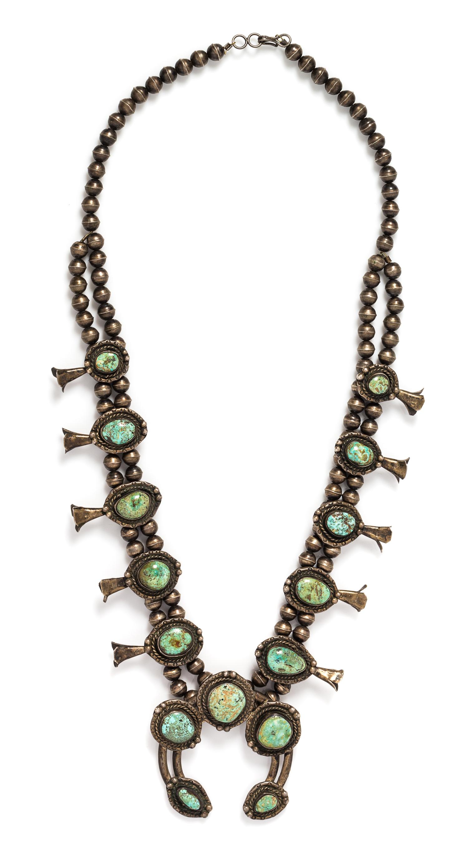 A Silver and Turquoise Squash Blossom Necklace, 128.00 dwts.