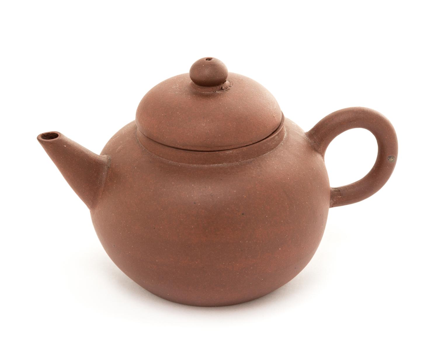 A Yixing Pottery Teapot Height 3 inches.