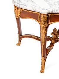 A Louis XV Style Gilt Bronze Mounted Marble-Top Center Table