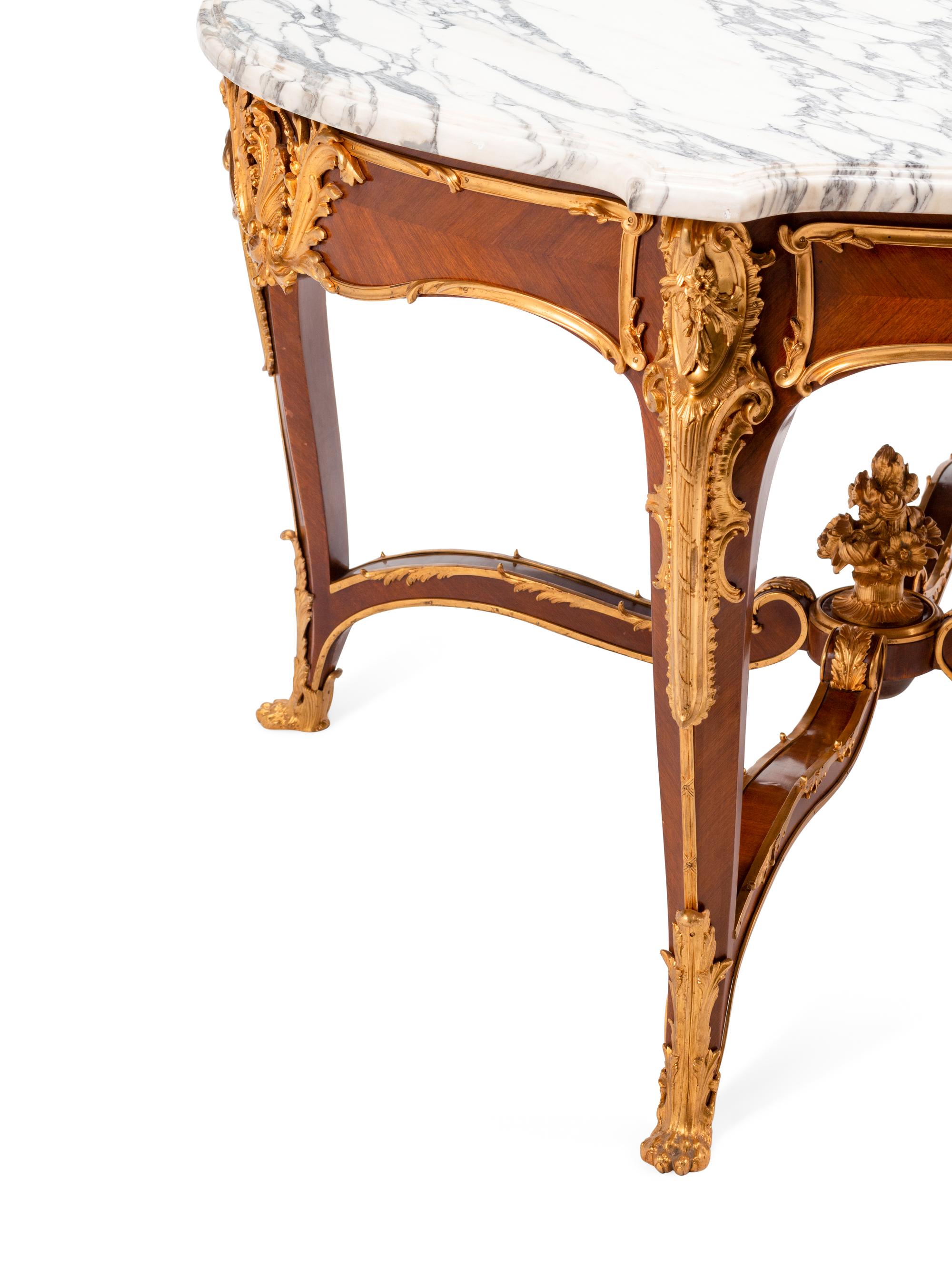 A Louis XV Style Gilt Bronze Mounted Marble-Top Center Table