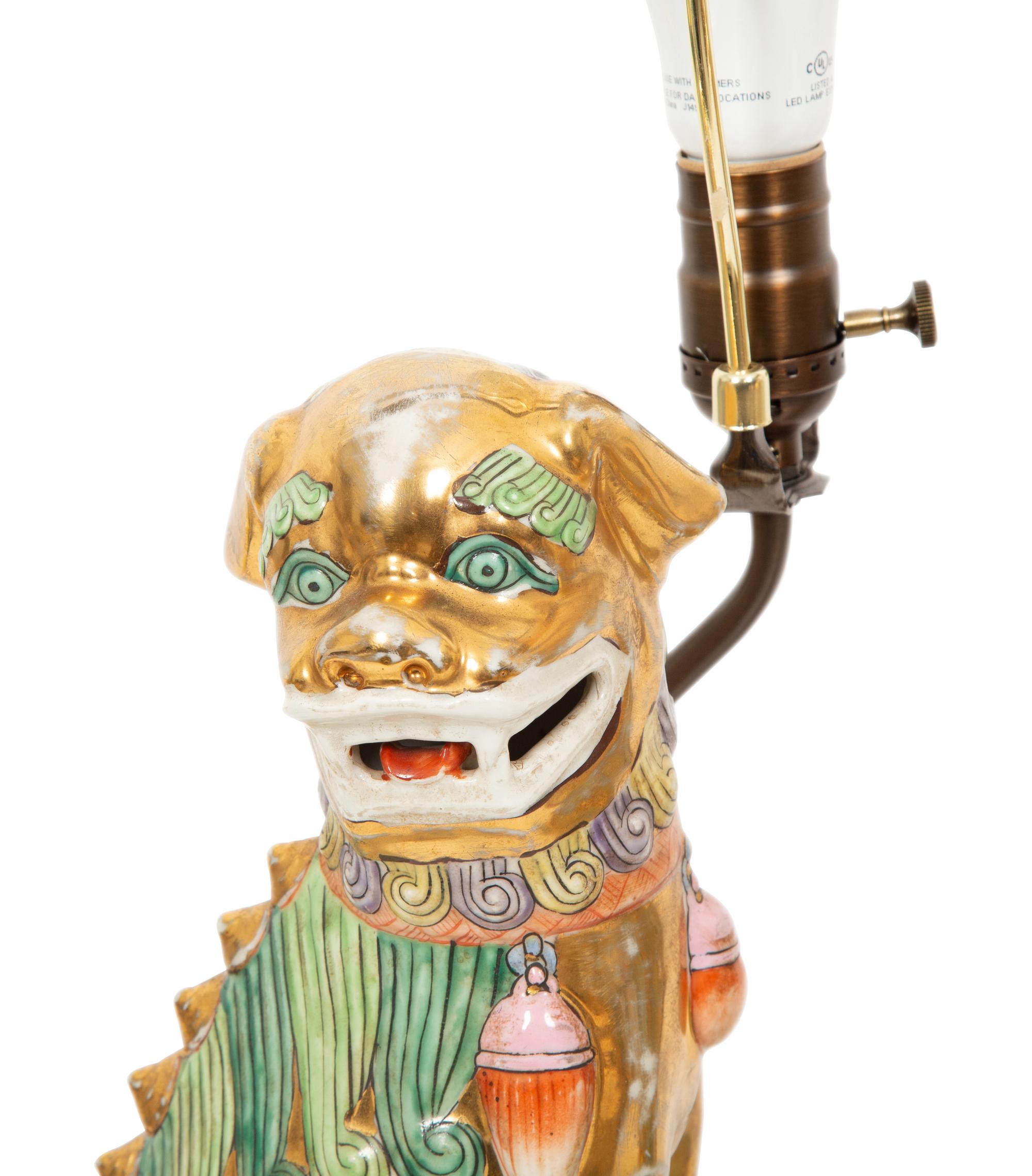 A Pair of Chinese Porcelain Foo Dog Table Lamps