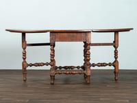 A William and Mary Figured Maple Drop Leaf Dining Table