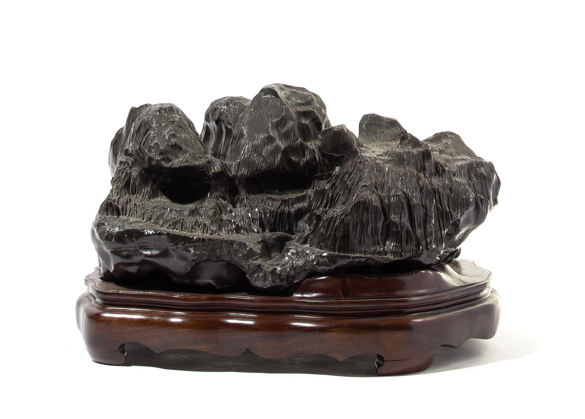 A Chinese Scholar's Rock Height 10 1/2 inches overall.