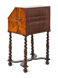 A William and Mary Walnut Slant-Front Bureau on Later Stand