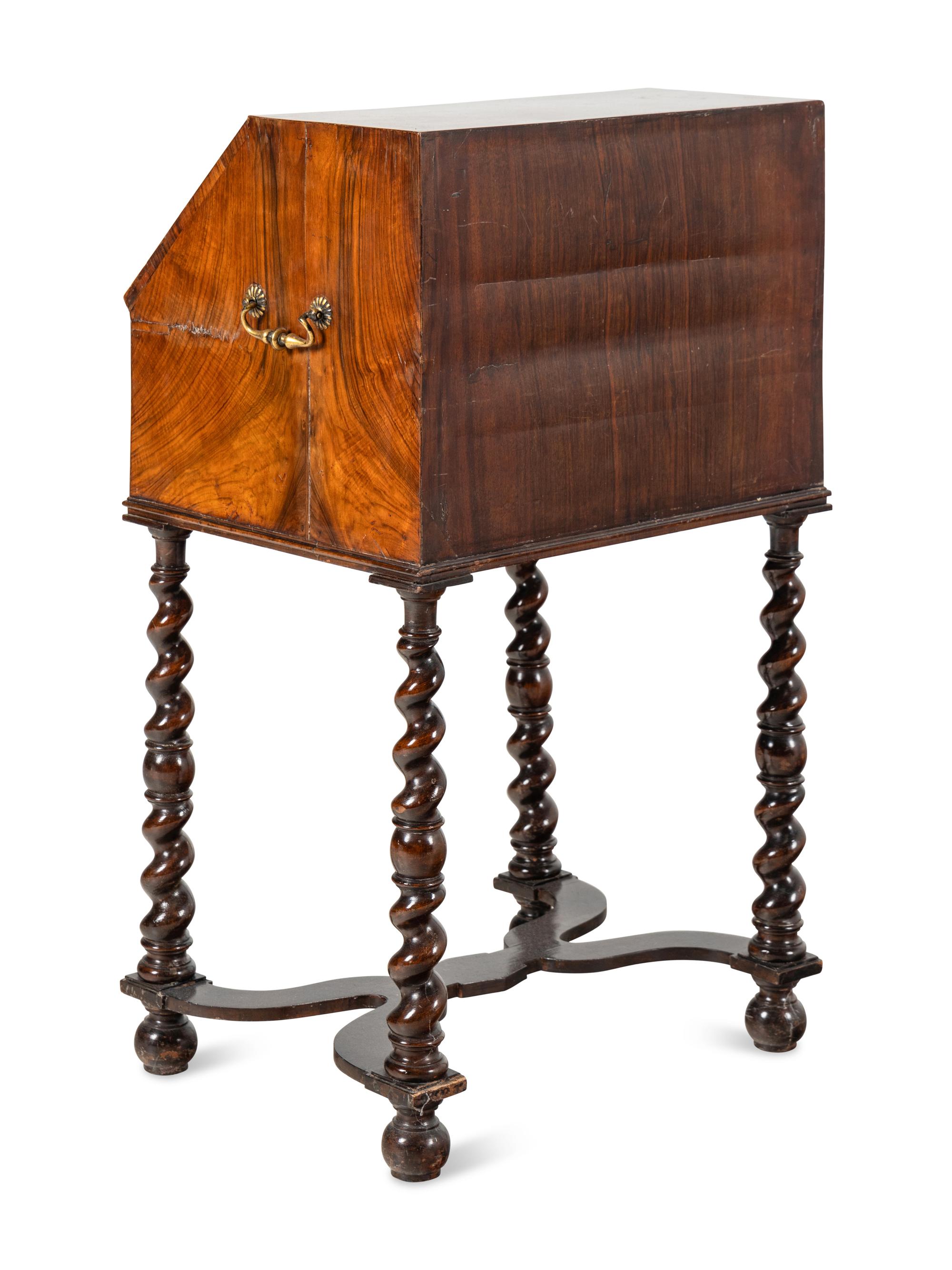 A William and Mary Walnut Slant-Front Bureau on Later Stand