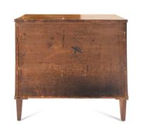 A Biedermeier Walnut and Parcel Ebonized Commode