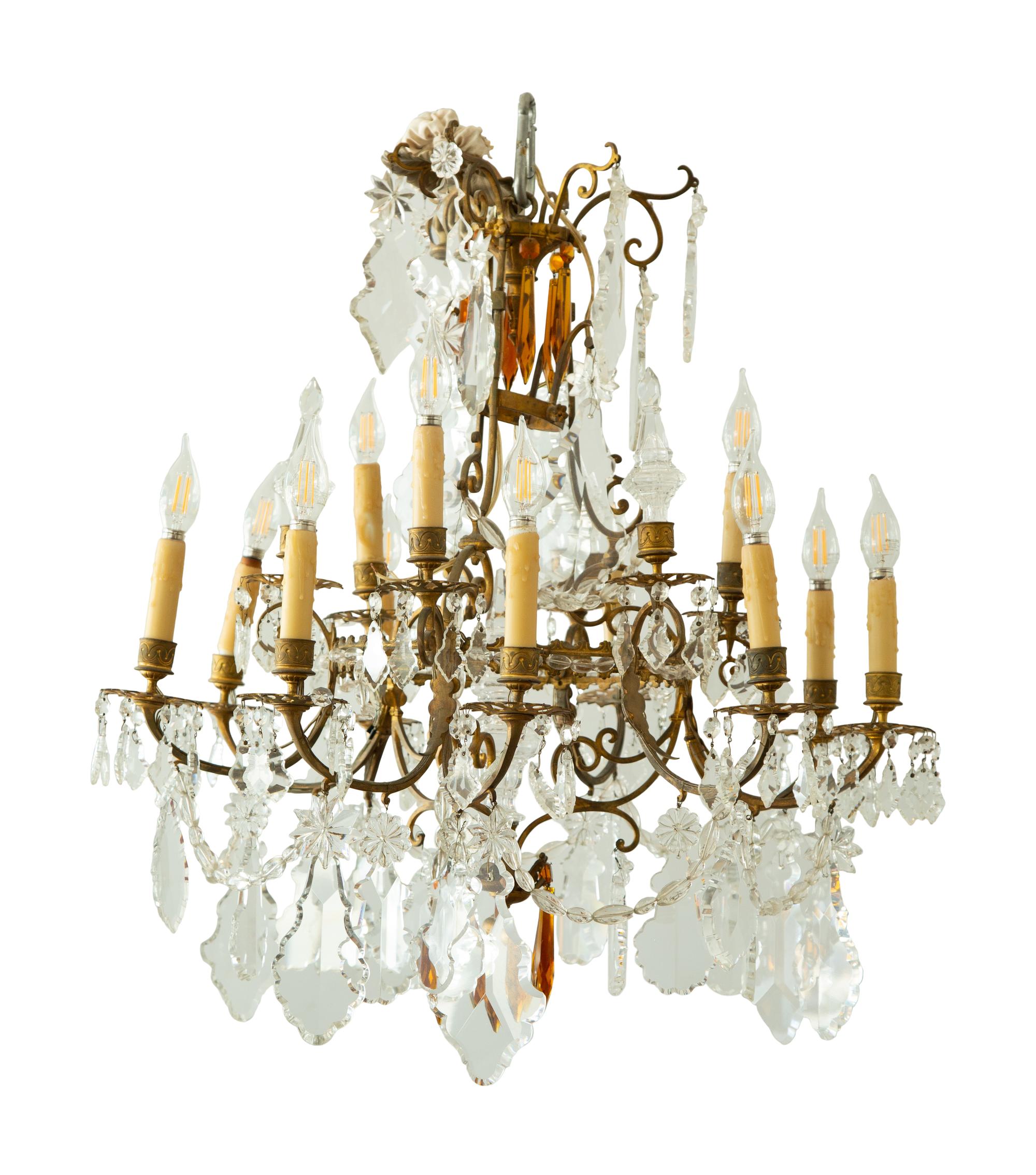 A Louis XV Style Gilt Bronze and Cut Glass Twelve-Light Chandelier