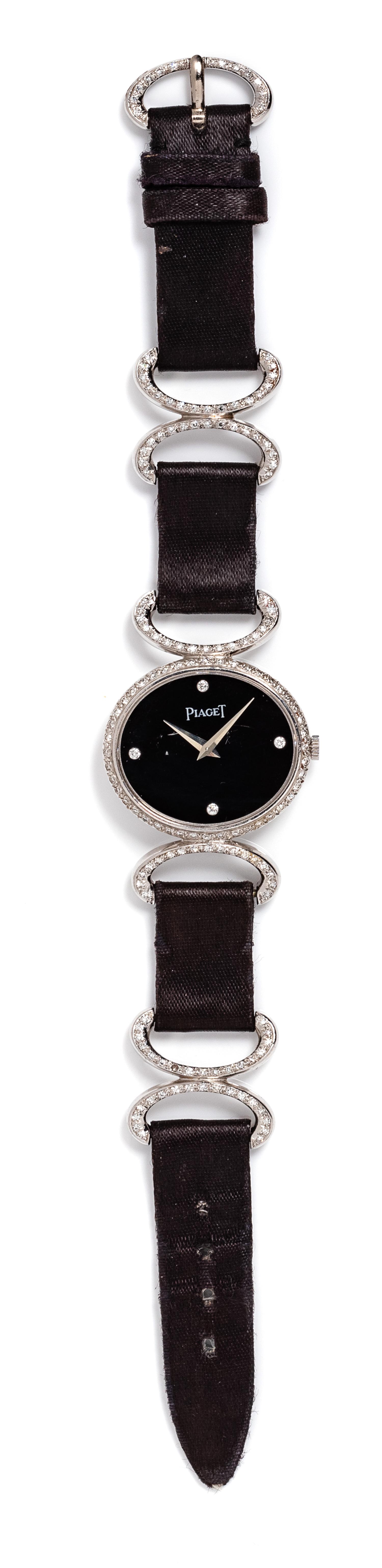 An 18 Karat White Gold and Diamond Ref. 9802DB Wristwatch, Piaget, 20.20 dwts. (including strap)