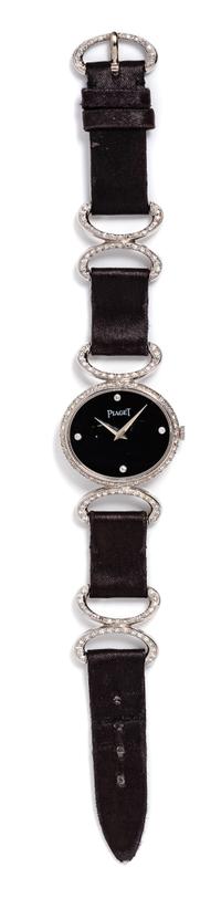 An 18 Karat White Gold and Diamond Ref. 9802DB Wristwatch, Piaget, 20.20 dwts. (including strap)