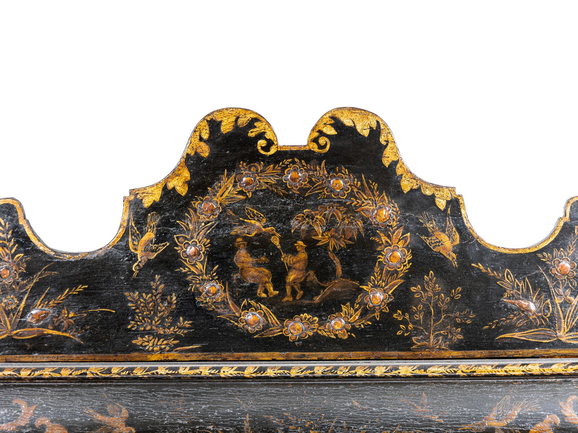 A North Italian Black Japanned Cushion Mirror