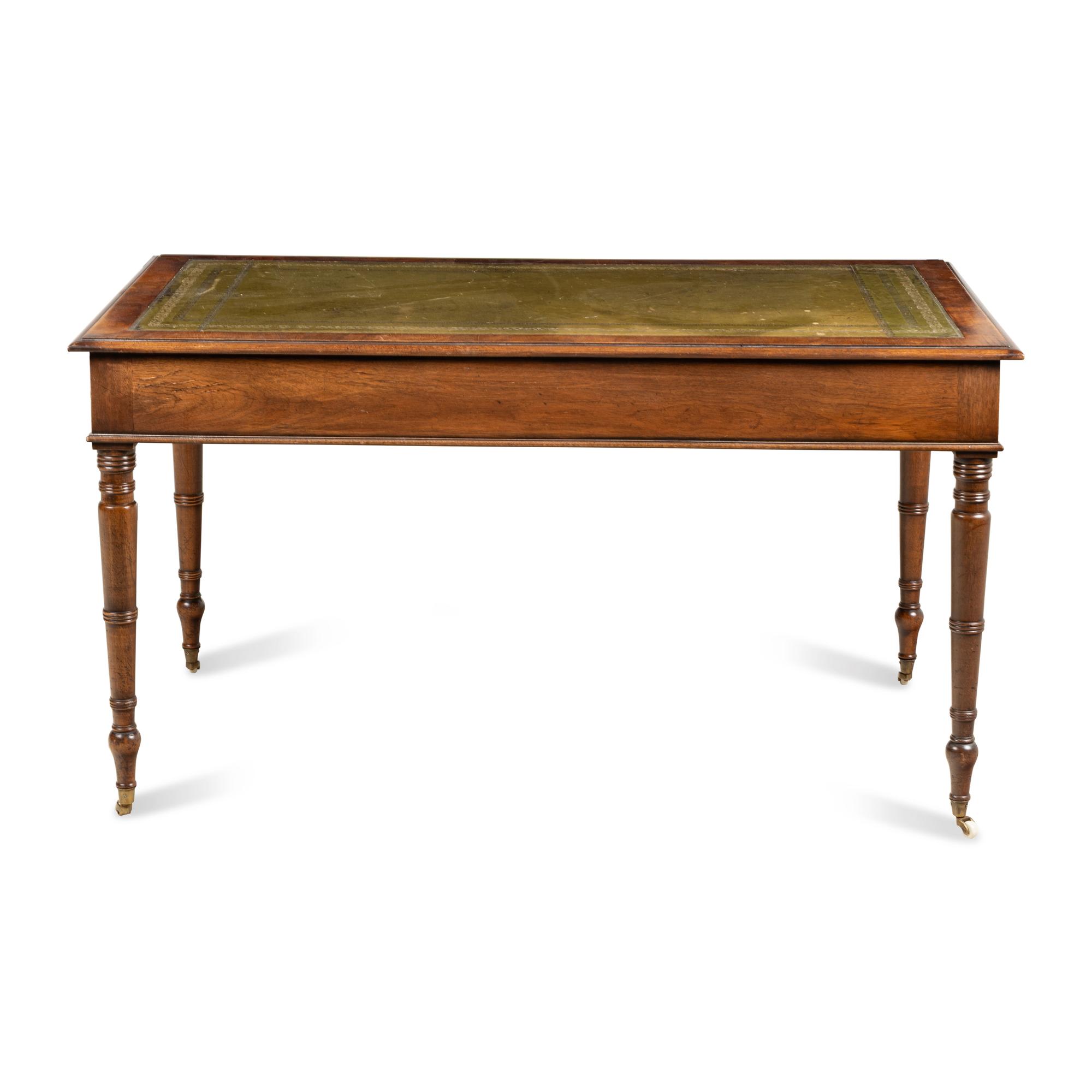 A Regency Style Tooled-Leather Inset Mahogany Writing Desk
