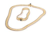 An 18 Karat Gold and Sapphire Demi Parure, 30.90 dwts.