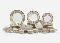 A Christian Dior enamel and gold-decorated porcelain dinner service in the "Renaissance" pattern, 1991-1999