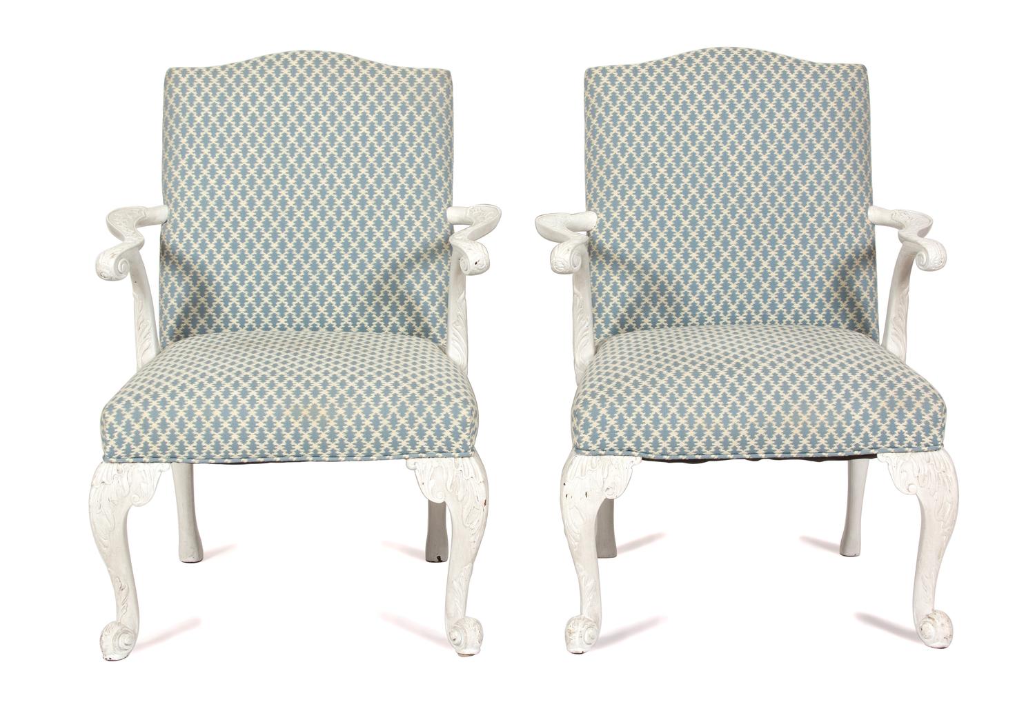A Pair of George III Style Carved White Painted Open Armchairs Height 44 x width 26 x depth 24 inches. — 20TH CENTURY