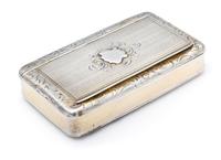 A French Silver Snuff Box, Maker's Mark Obscured, of rectangular form, the lid rim worked to show floral and foliate motifs, the lid wi