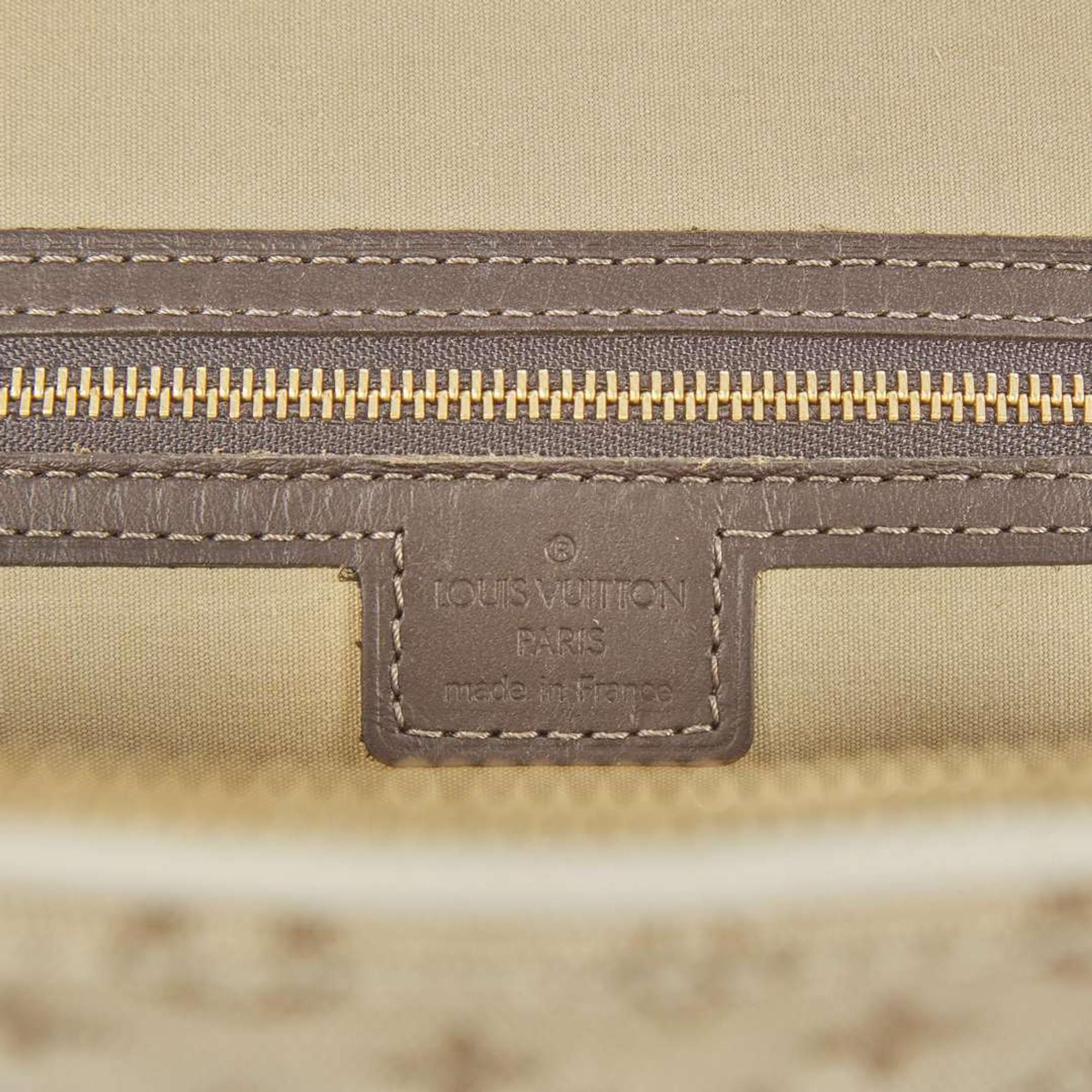 A Louis Vuitton Alma Haut in Khaki Coated Canvas Louis Vuitton