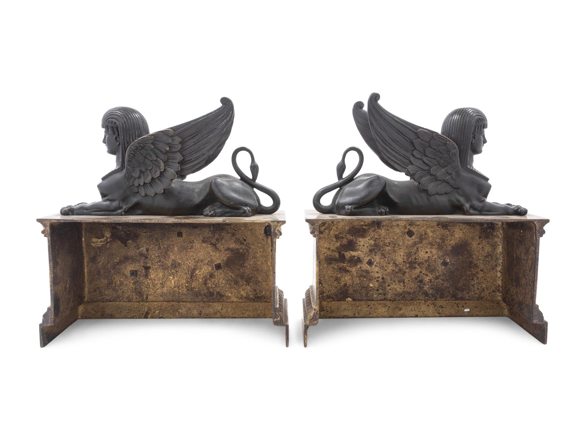 A Pair of Empire Gilt and Patinated Bronze Sphinx Ornaments