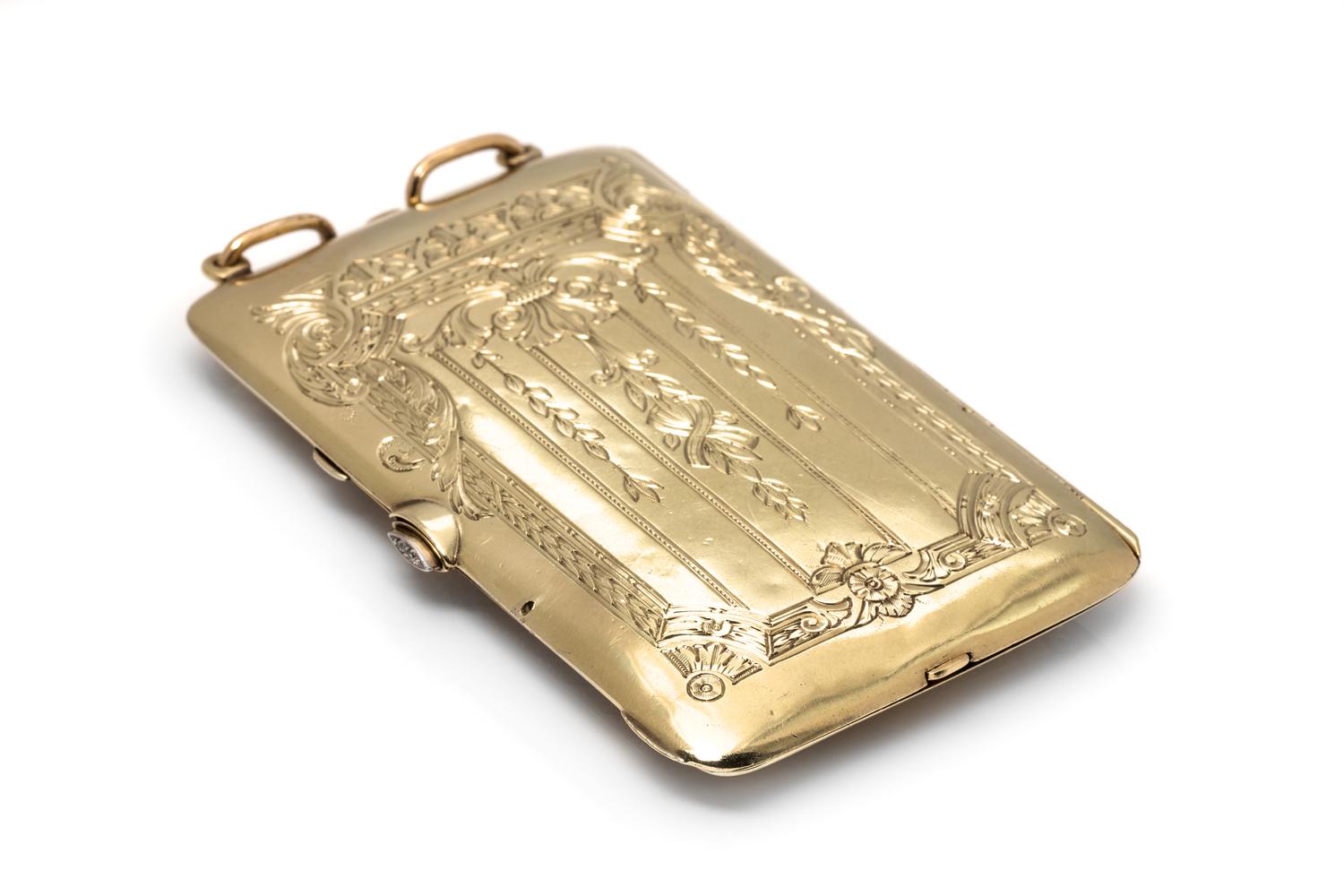 An Edwardian Platinum Topped Yellow Gold and Diamond Necessaire Pendant,
