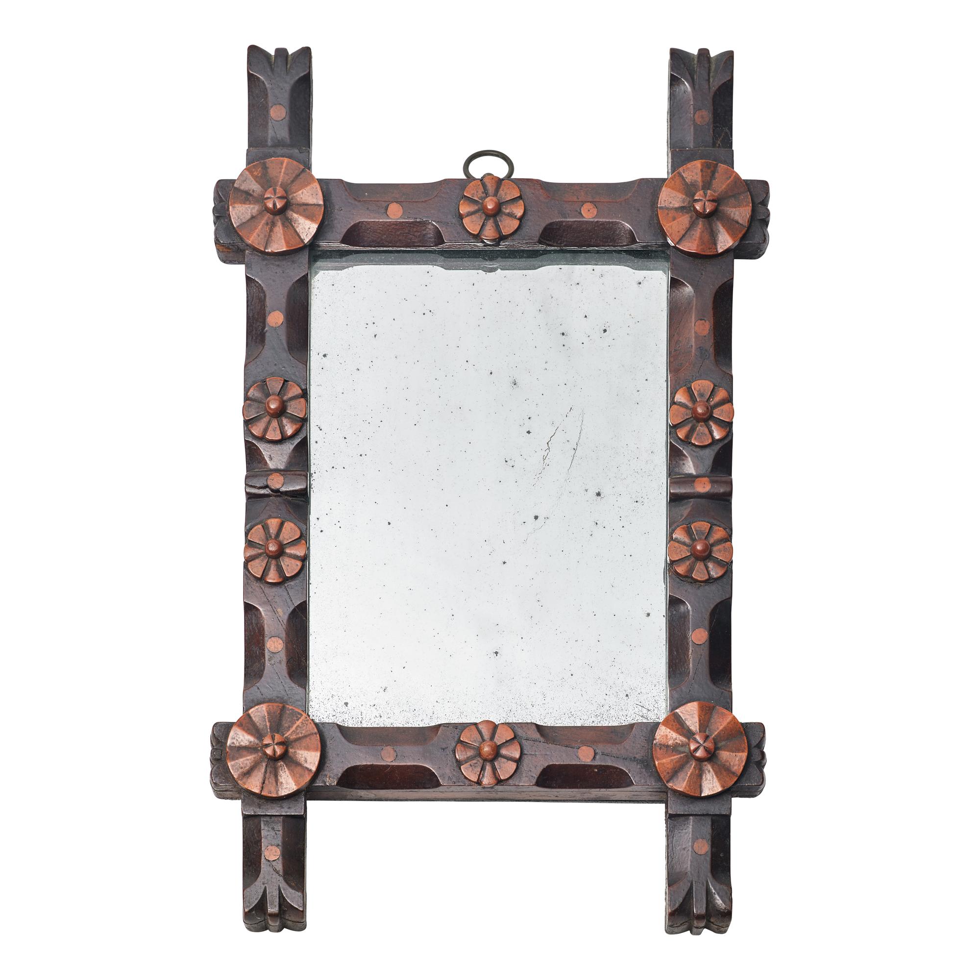 A Small Aesthetic Movement Carved Wood Mirror