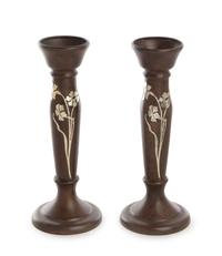 A Pair of American Art Nouveau Silver Inlaid Bronze Candlesticks, Heintz Art Metal Shop, Buffalo, NY, the bronze stem of baluster form,
