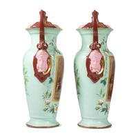 A Pair of Continental Porcelain Urns with Hand Painted and Transfer Decoration
