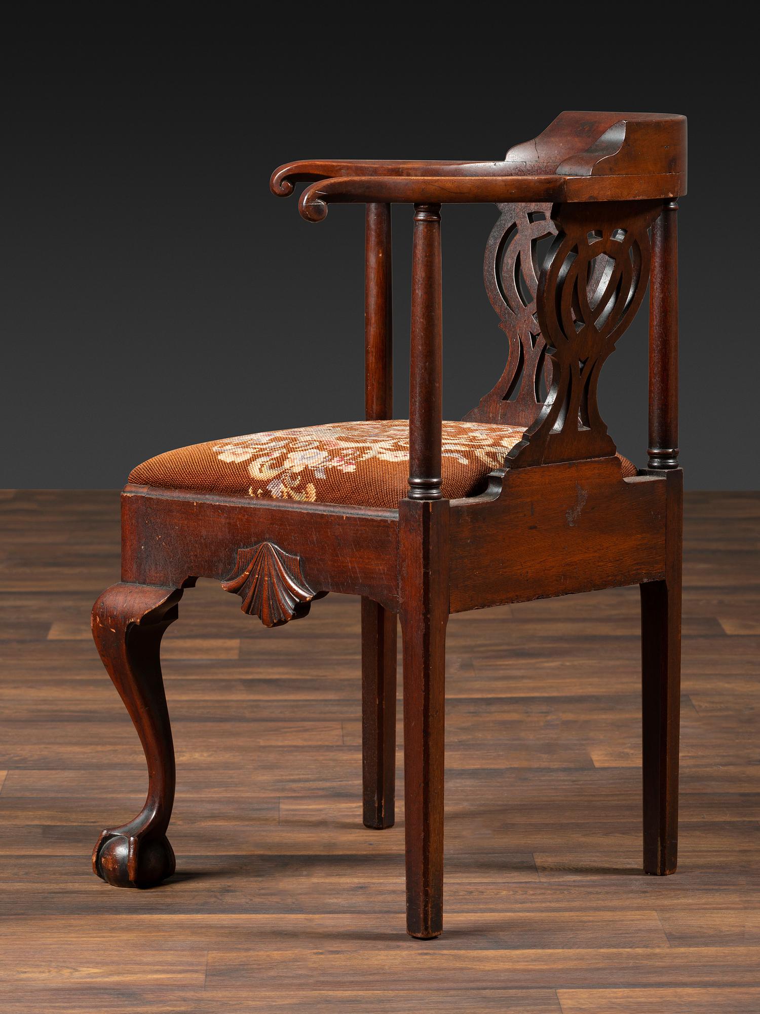 A Chippendale Shell-Carved Mahogany Knuckle-Arm Claw-and-Ball Foot Corner Chair