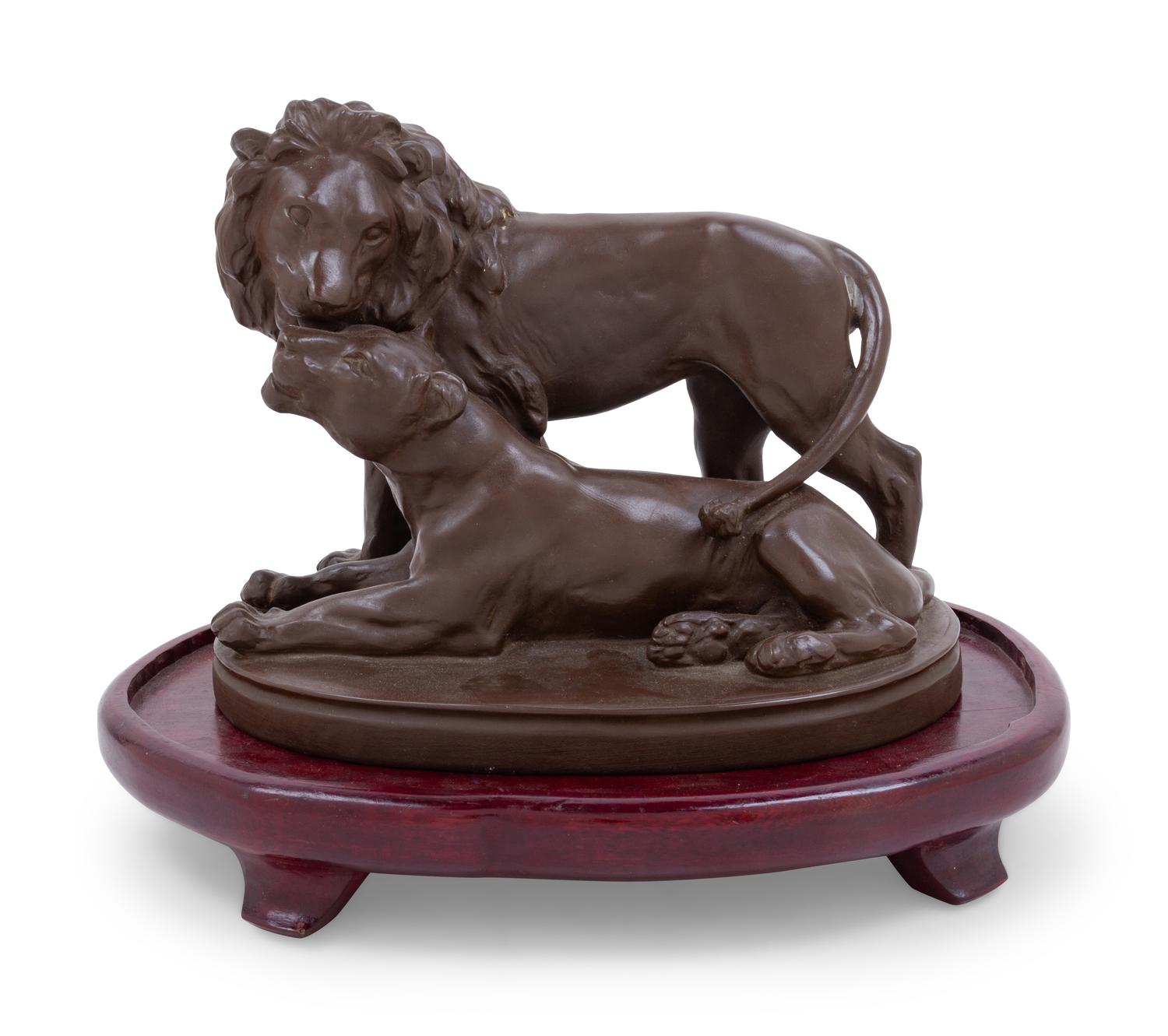 A Continental Brown Stoneware Lion Group