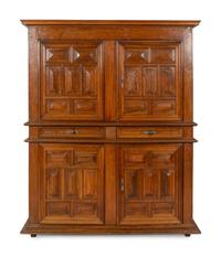 A Large Italian Baroque Carved Walnut Deux Corps Cabinet