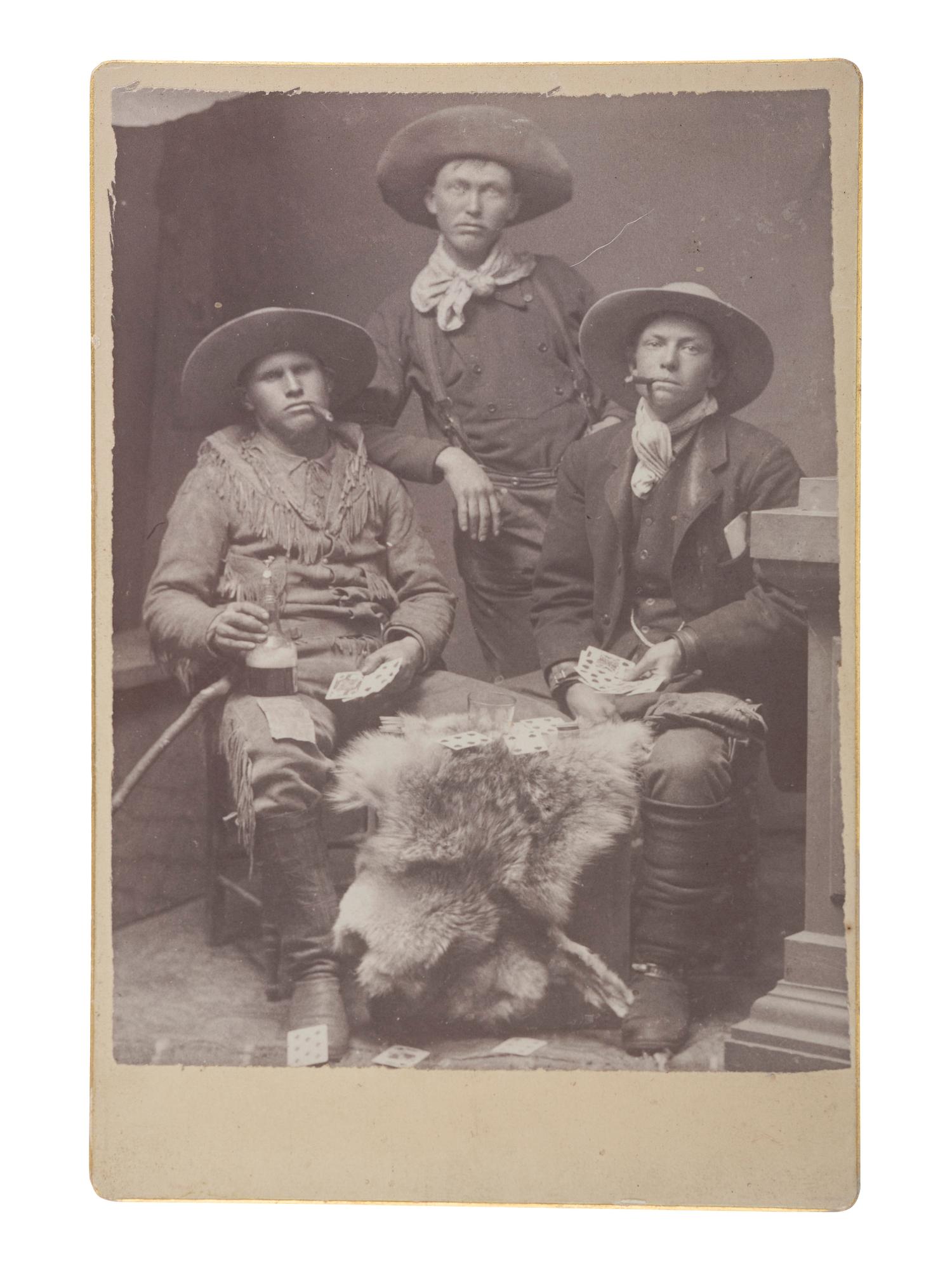 [EARLY PHOTOGRAPHY] -- [WESTERN AMERICANA]. A group of 3 photographs of western subjects and scene, incl. a frontiersman, gamblers, and a Washington state horse show.