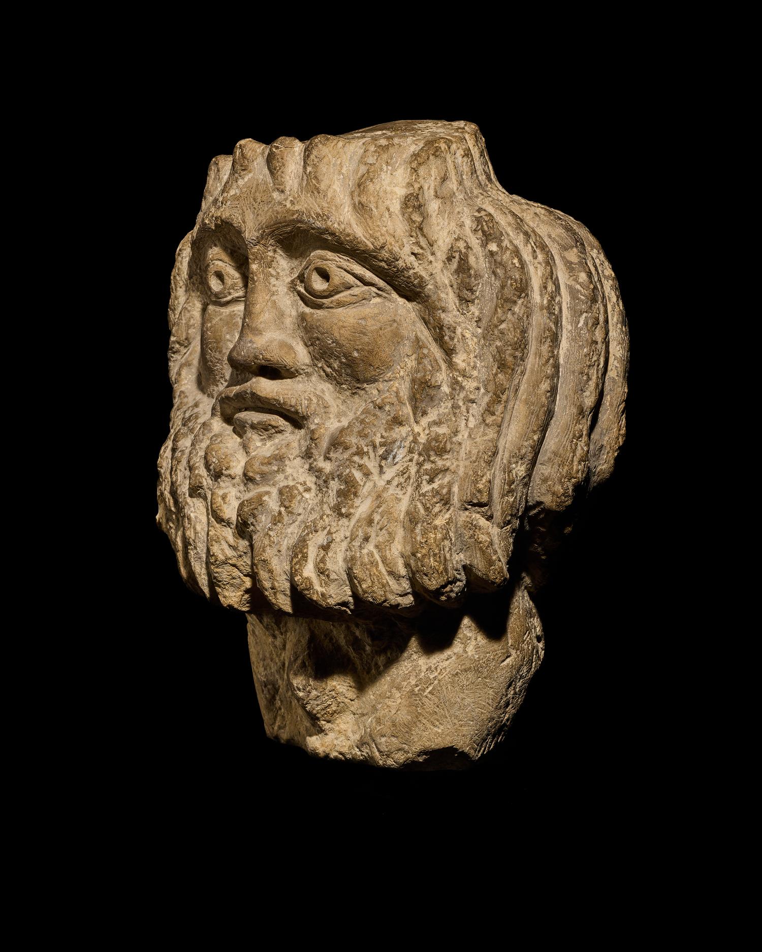 A Coptic Limestone Bust of Zeus