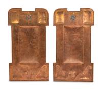 A Pair of Arts and Crafts Hammered Copper Sconces