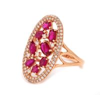 A 14 Karat Rose Gold, Ruby and Diamond Ring,