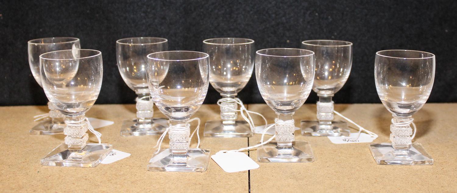 A Set of Eight Lalique Glass Cordials Height 3 1/4 inches.