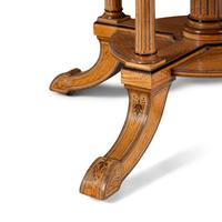 An English Part-Ebonized Satinwood, Harewood and Marquetry Center Table