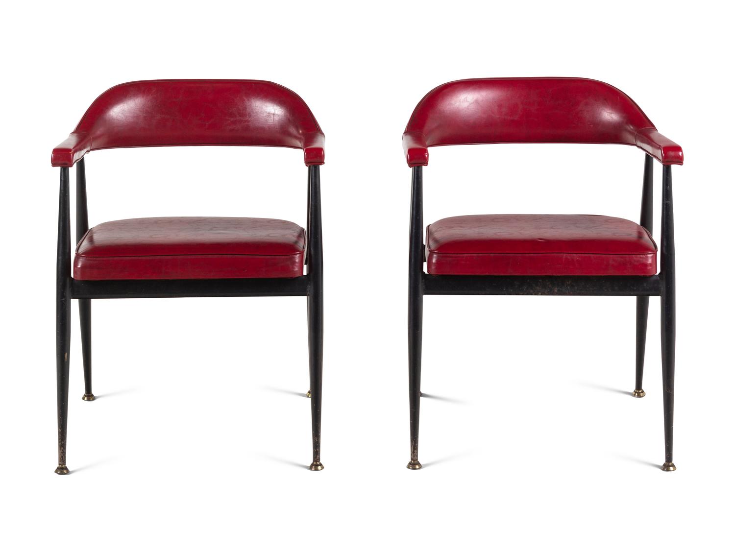 A Pair of Modernist Vinyl Armchairs