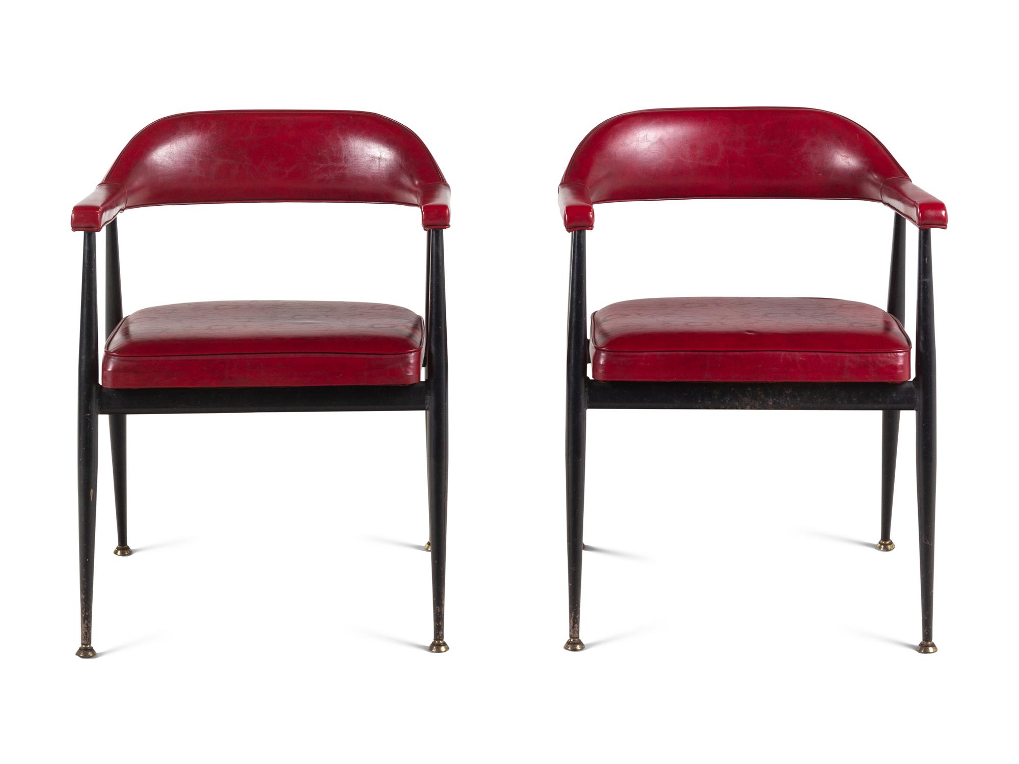 A Pair of Modernist Vinyl Armchairs