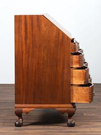 A Chippendale Carved Mahogany Reverse Serpentine Block-Front Desk
