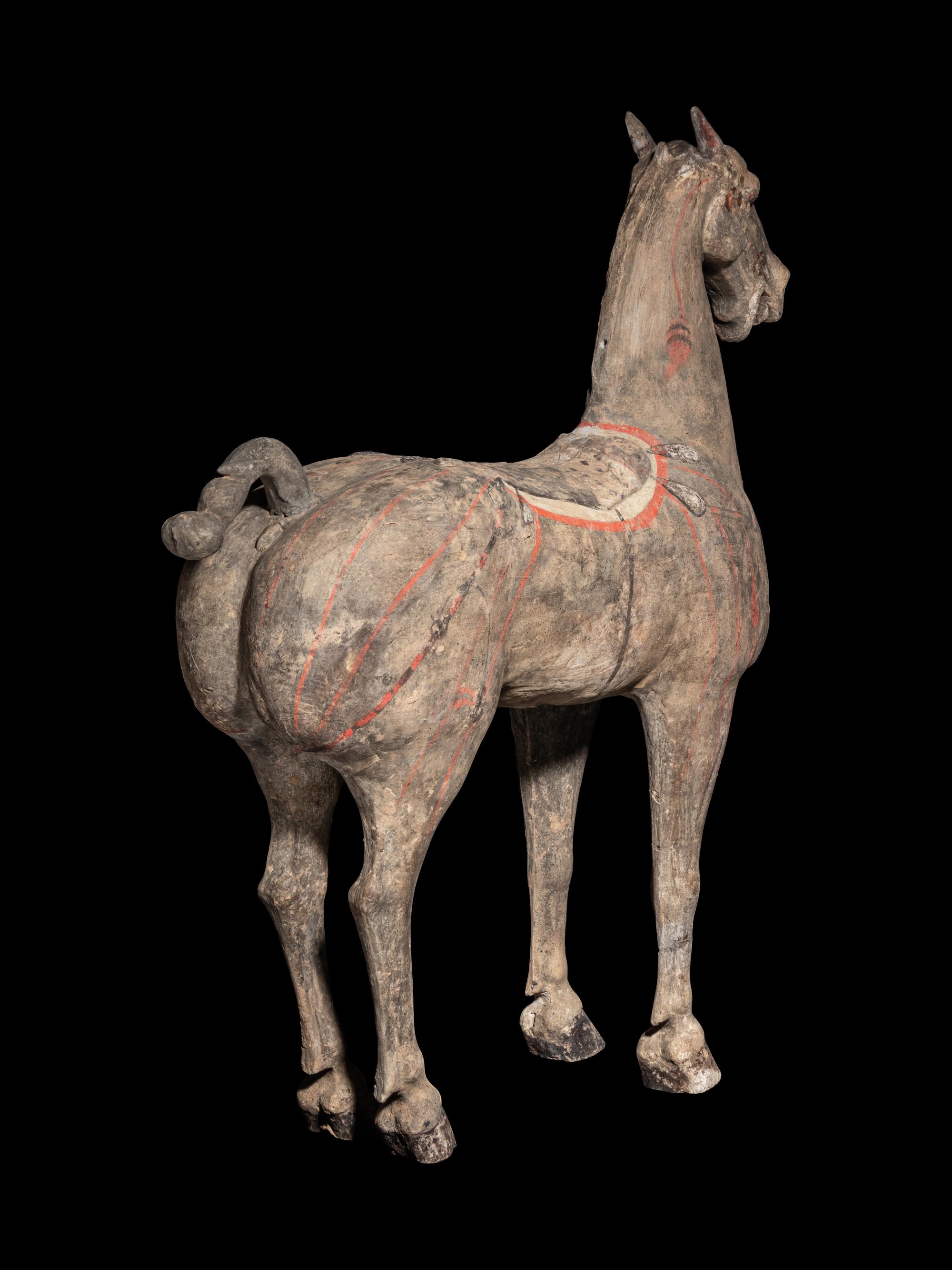 A Grey Pottery Figure of a Horse