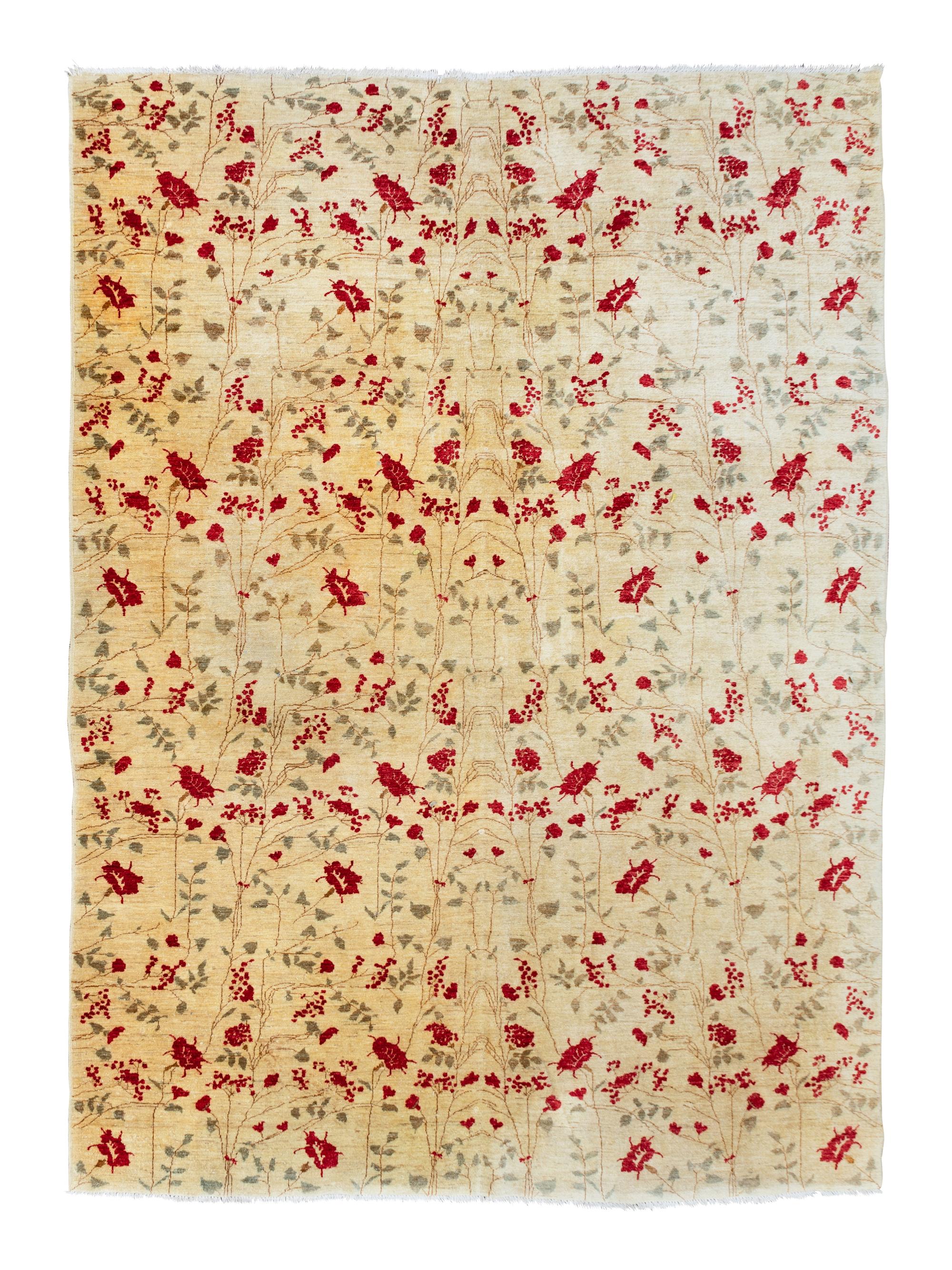 A Floral Patterned Wool Rug — 20TH CENTURY