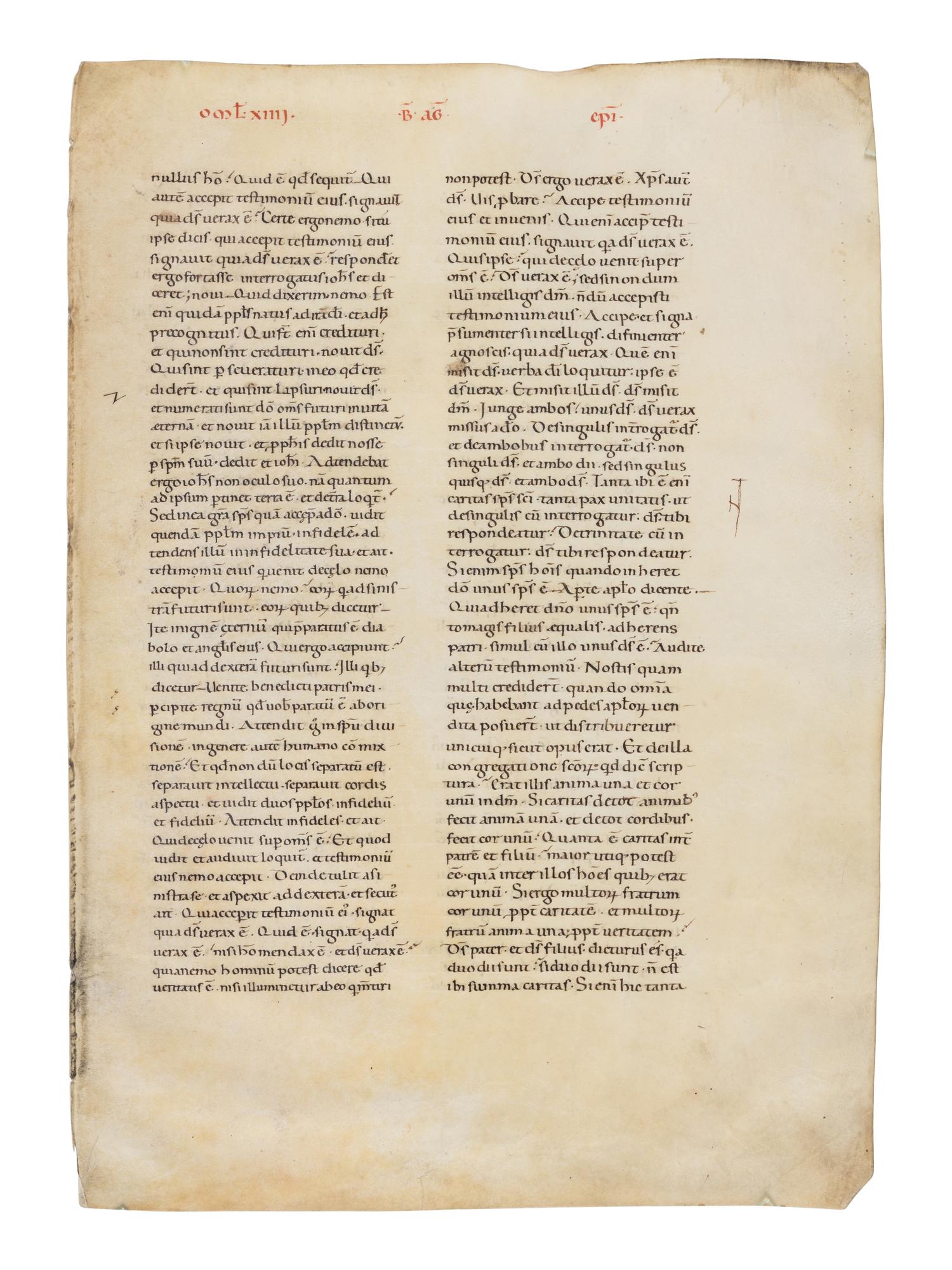 MAGNIFICENT REMNANT OF ITALIAN ROMANESQUE MANUSCRIPT CULTURE Florentine School, single leaf from a copy of Augustine’s Tractatus in euangelium Iohanem (Homily XIIII), in Latin, manuscript on parchment [Italy, Tuscany c. 1130–1150]
