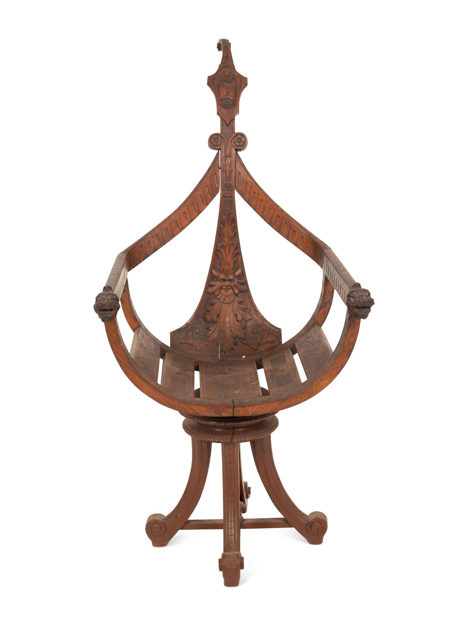 An Italian Carved Mahogany Gondola Chair with Swivel Seat