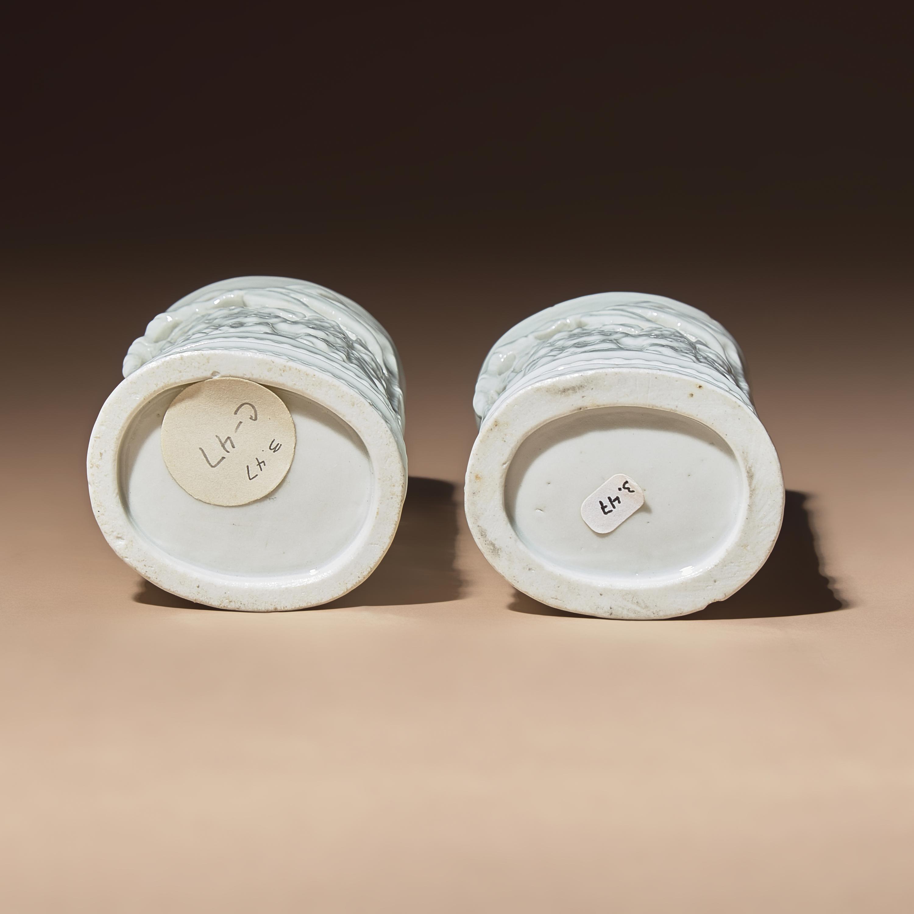 A Pair of Chinese Blanc-de-Chine Reticulated Porcelain 'Scholars' Brush Pots, Bitong, 17th-18th Century — 清早期 德化白瓷鏤雕竹林七賢筆筒一對