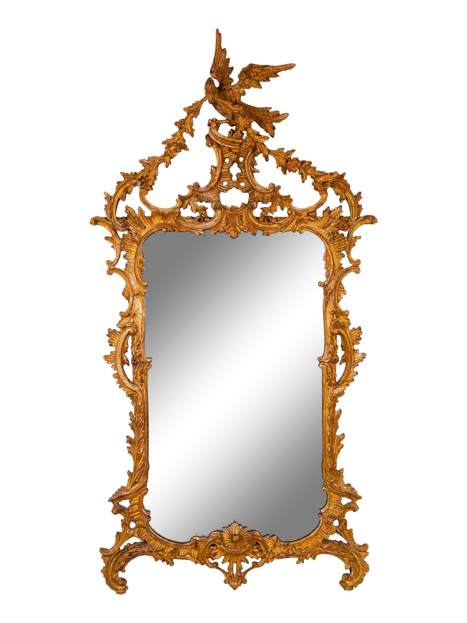 A George II Style Carved and Distressed Gilt Wood Mirror — 19TH CENTURY