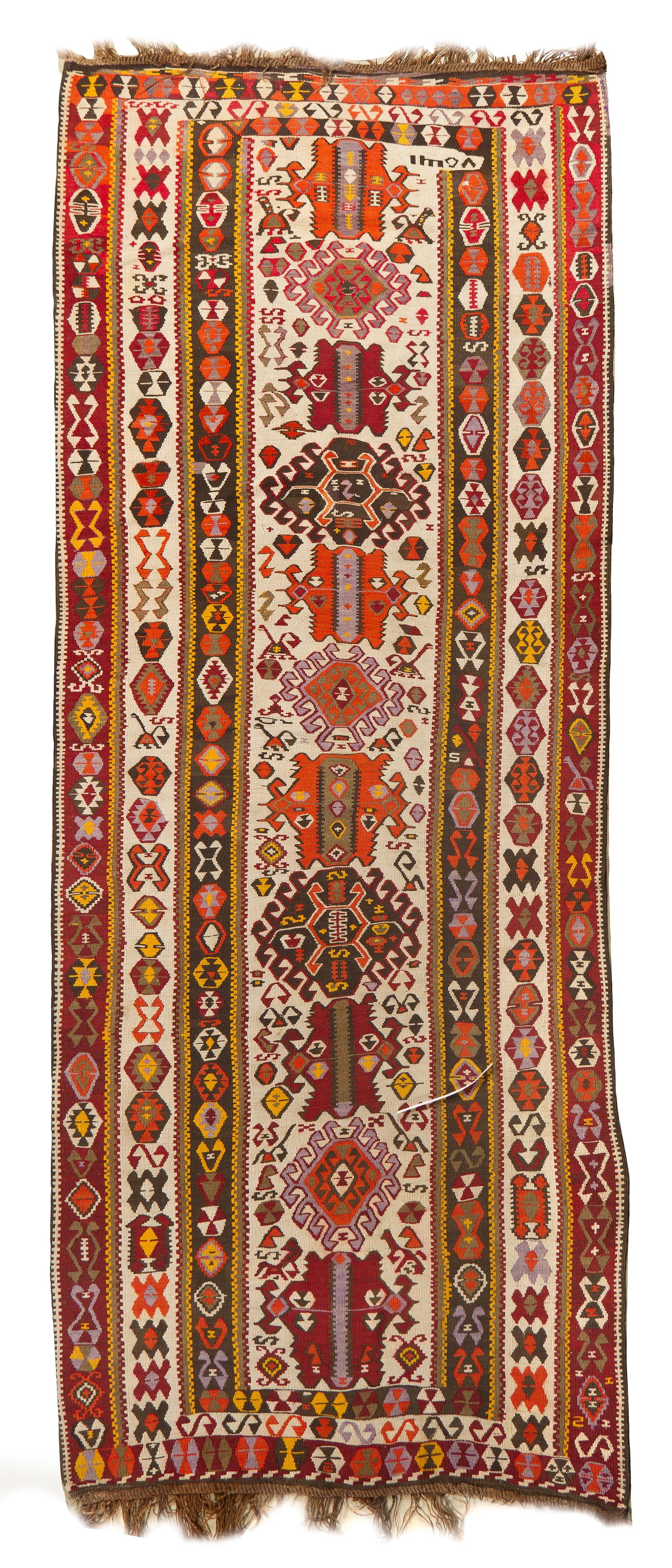 A Kilim Wool Runner, 12 feet 1 inch x 4 feet 10 1/2 inches.