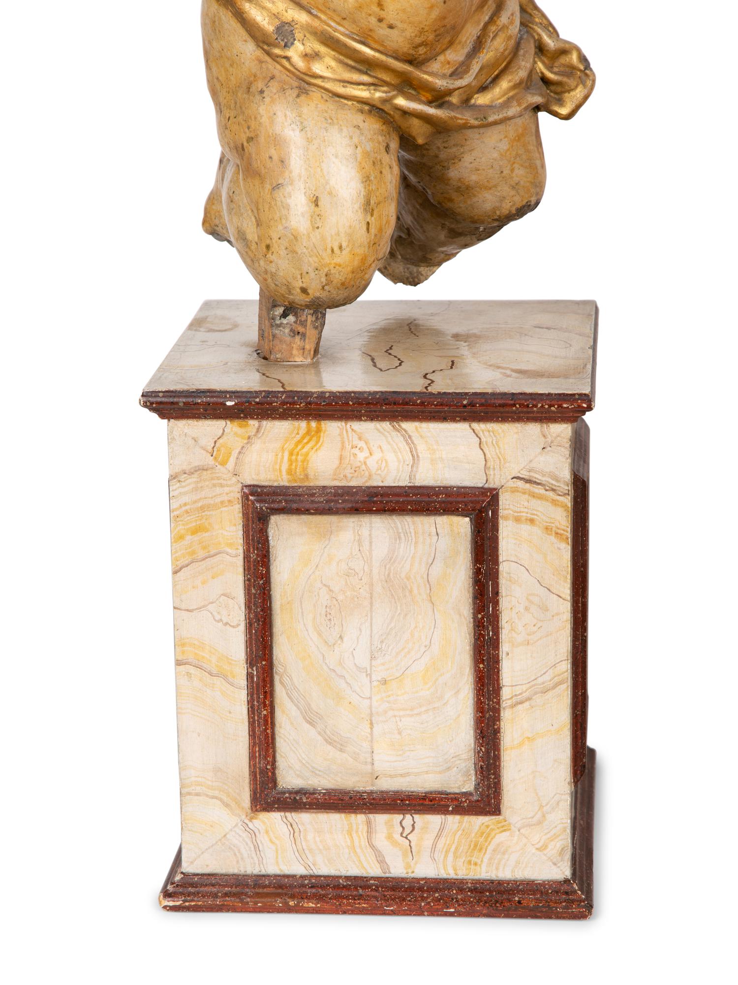 A Pair of Italian Carved and Parcel Gilt Cherubs — 19TH CENTURY