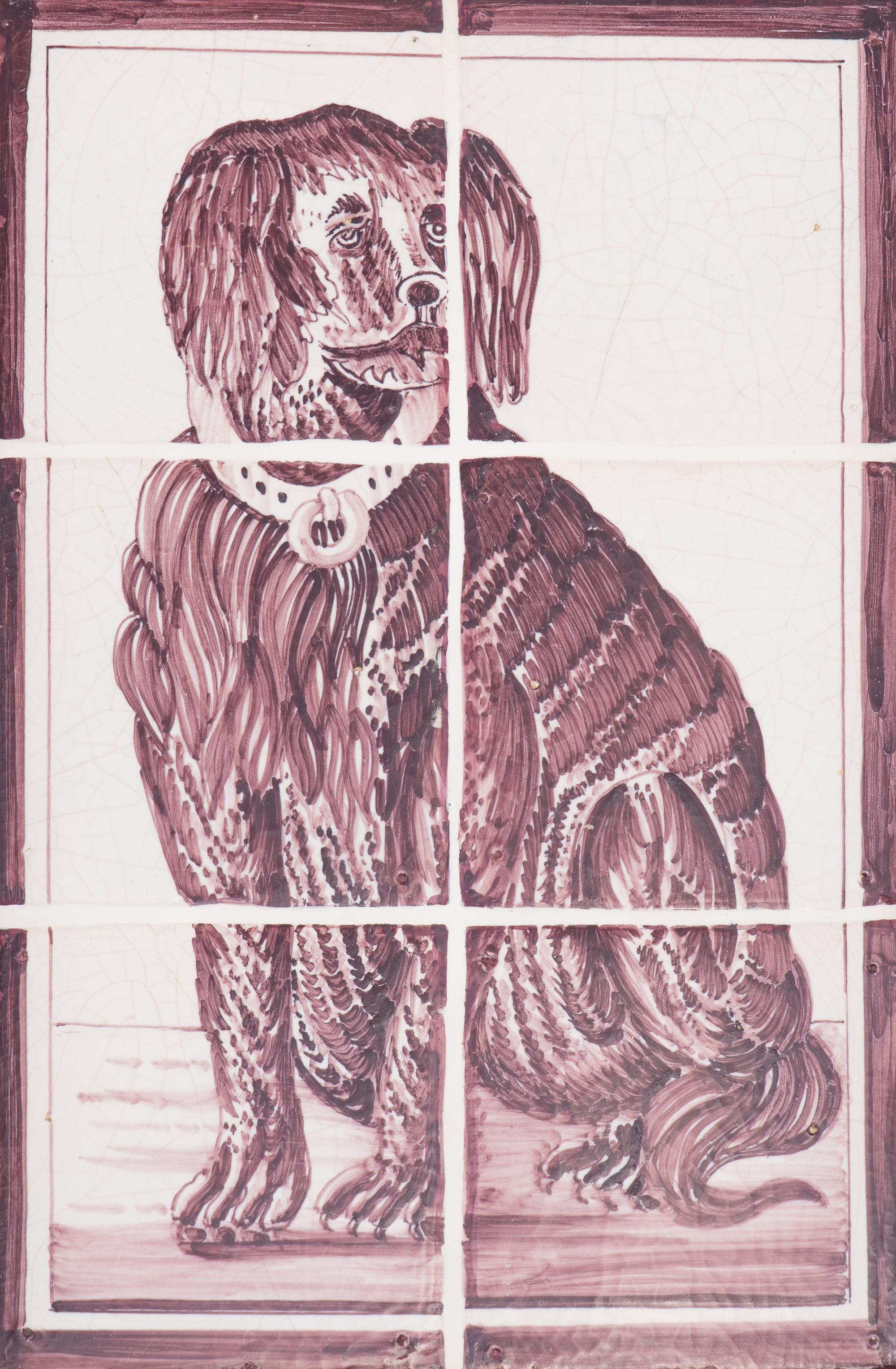 A Pair of Framed White and Sepia Glazed Tile Panels of Dogs